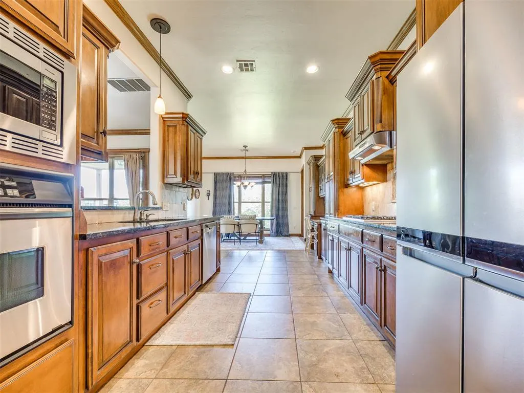 Photo 14 — 719 Prairie Dunes Way, Edmond, OK 73003