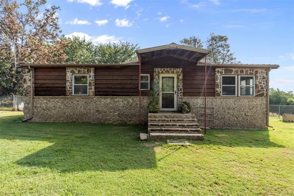 Front exterior — 10915 E Tecumseh Road, Norman, OK 73026