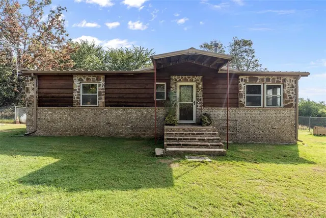 Front exterior — 10915 E Tecumseh Road, Norman, OK 73026