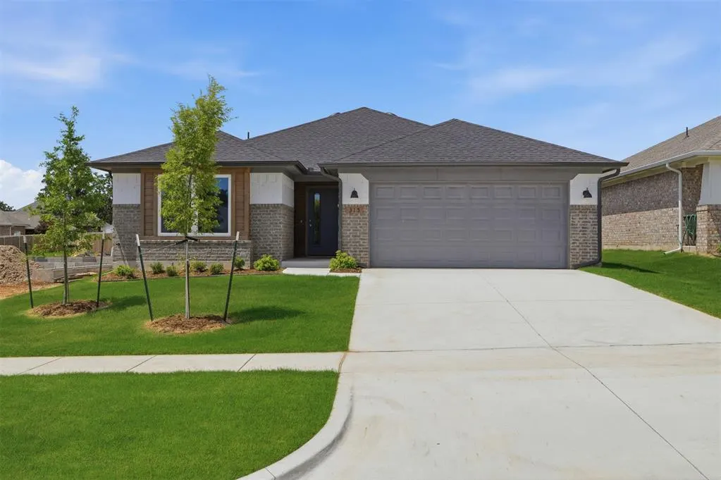 Front exterior — 315 Woodrock Street, Harrah, OK 73045