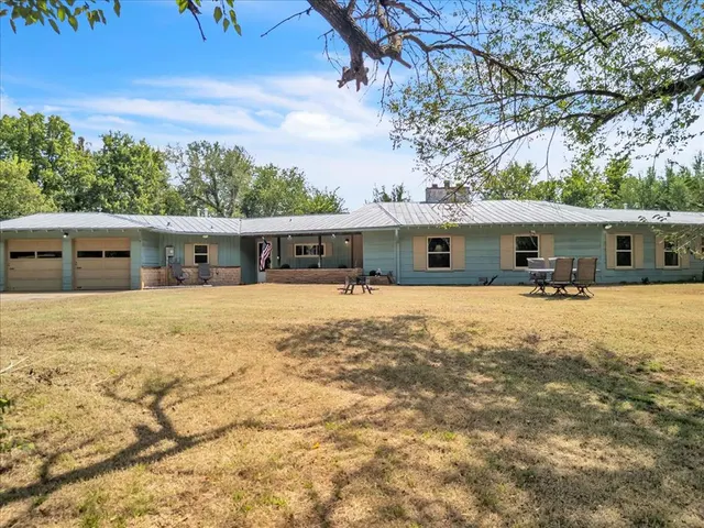 Front exterior — 703 Lombardy Road, Guthrie, OK 73044
