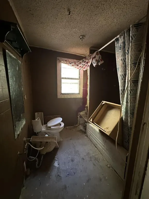 Photo 11 — 118 W Harrison Street, Maud, OK 74854