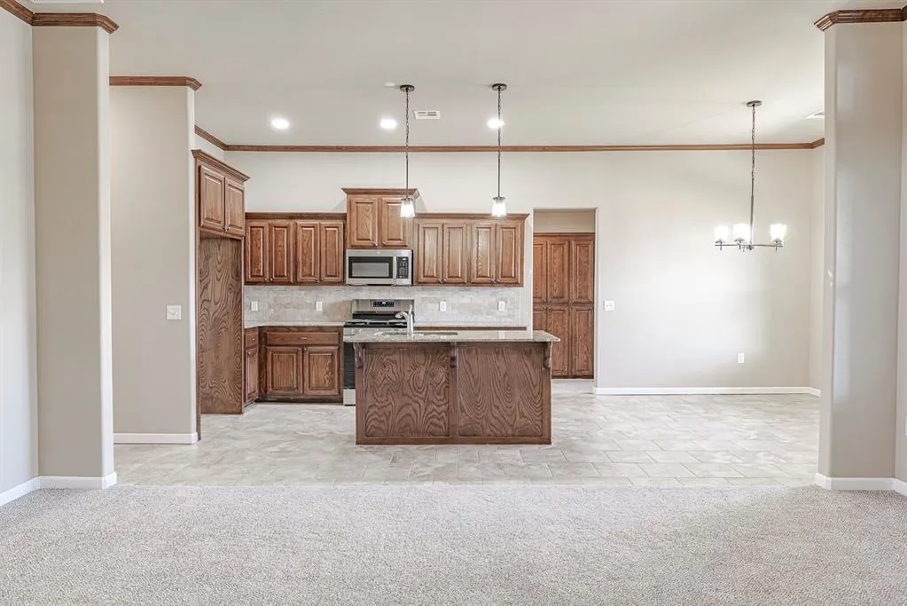 Photo 4 — 1923 W Flintlock Way, Mustang, OK 73064