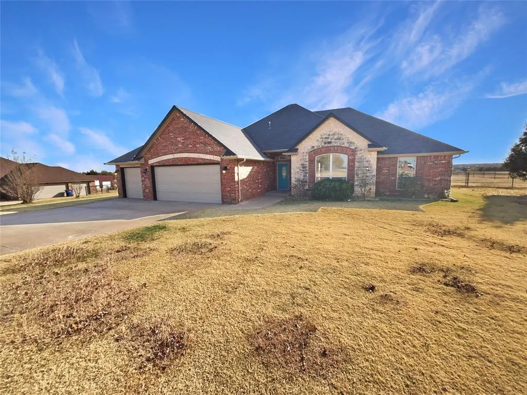 Front exterior — 1306 Songbird Lane, Blanchard, OK 73010