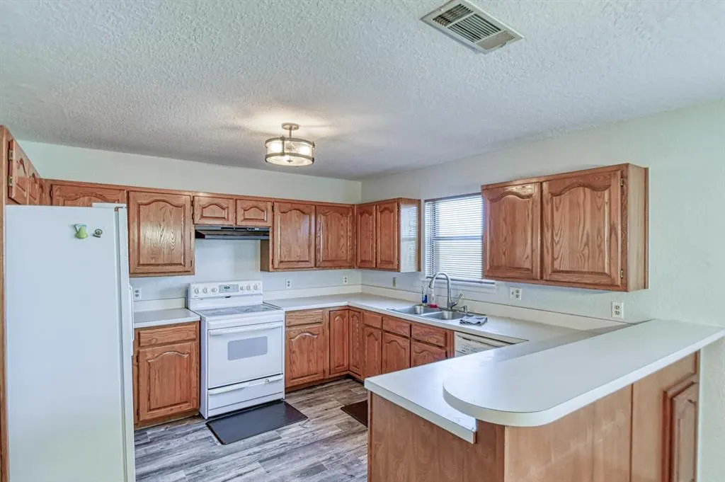 Photo 16 — 1027 Woodbrook Boulevard, Purcell, OK 73080