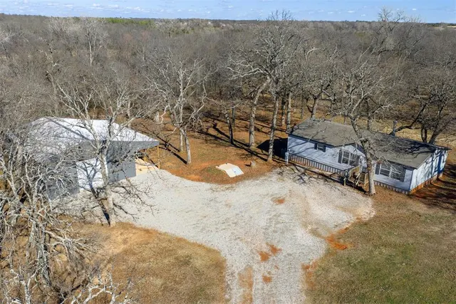 Front exterior — 19573 W Juanita Lane, Tecumseh, OK 74873