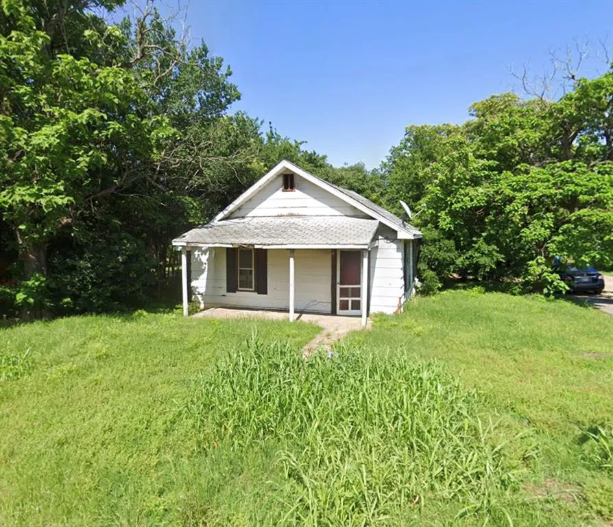 Front exterior — 302 N Hartman Avenue, Cushing, OK 74023