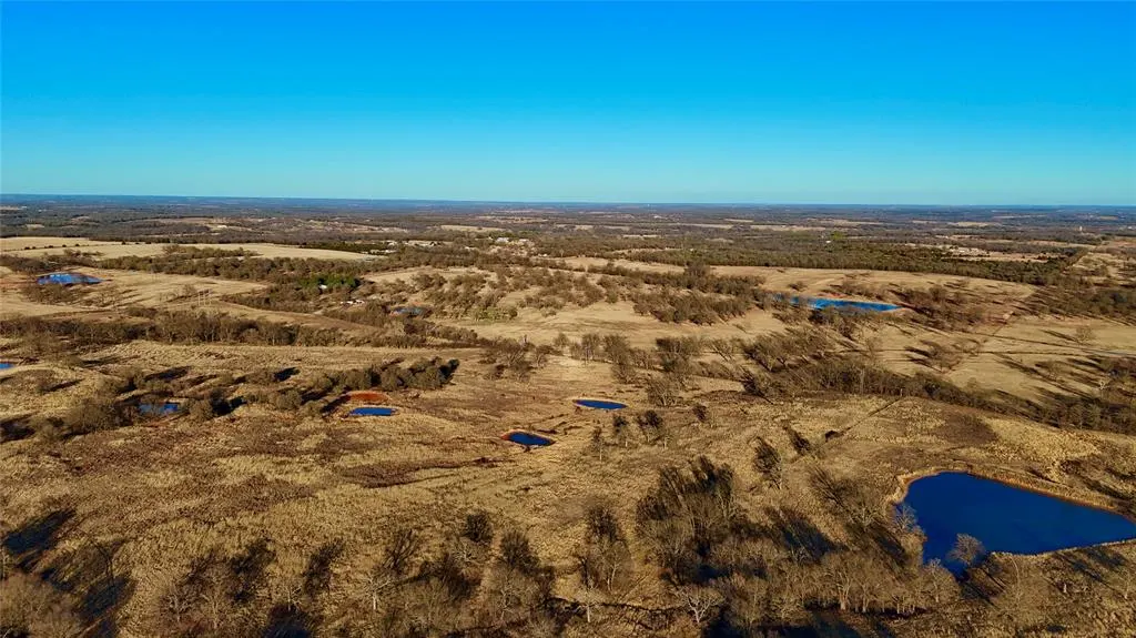 Front exterior — 14 Wilshire Drive, McLoud, OK 74851