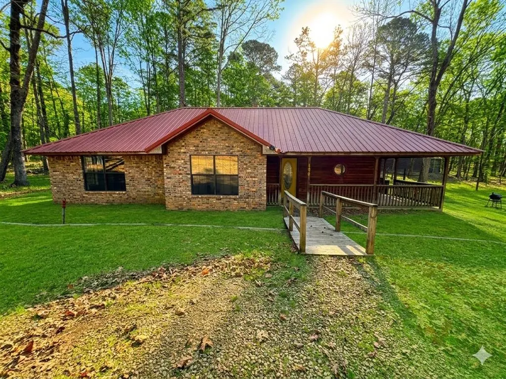 Front exterior — 106 Tranquil Lane, Hochatown, OK 74728