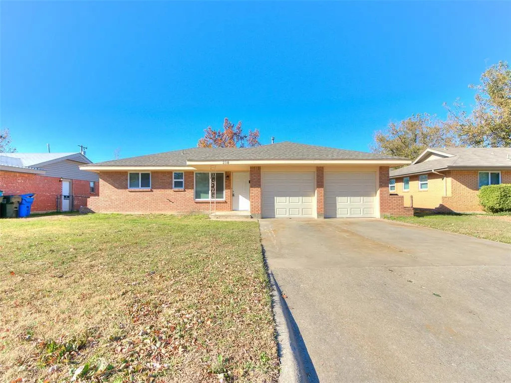 Front exterior — 214 Thompson Drive, Norman, OK 73069