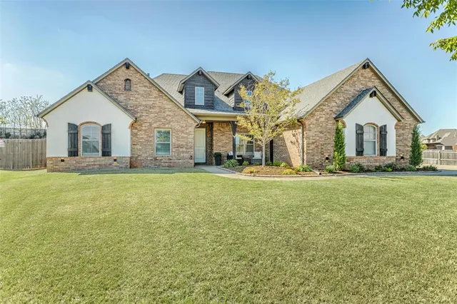 Front exterior — 15409 Colonia Bella Drive, Edmond, OK 73013