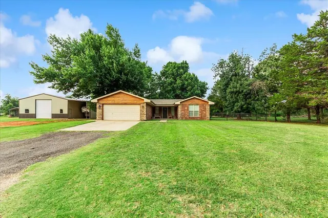 Front exterior — 12009 Hope Road, Mustang, OK 73064