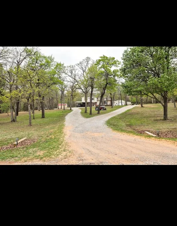 Front exterior — 21024 Judy Circle, McLoud, OK 74851