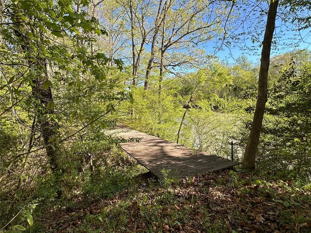 Photo 11 — TBD Riverside Lane, Smithville, OK 74957