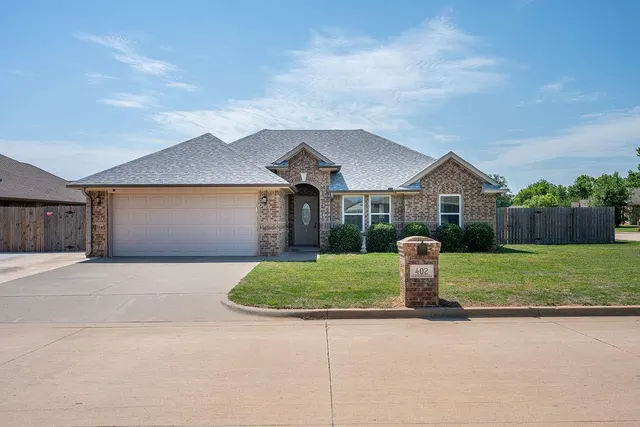 Front exterior — 402 E Kinder Wells Boulevard, Perkins, OK 74059