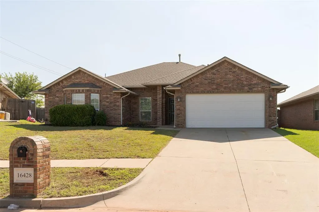 Front exterior — 16428 Village Common Drive, Edmond, OK 73013