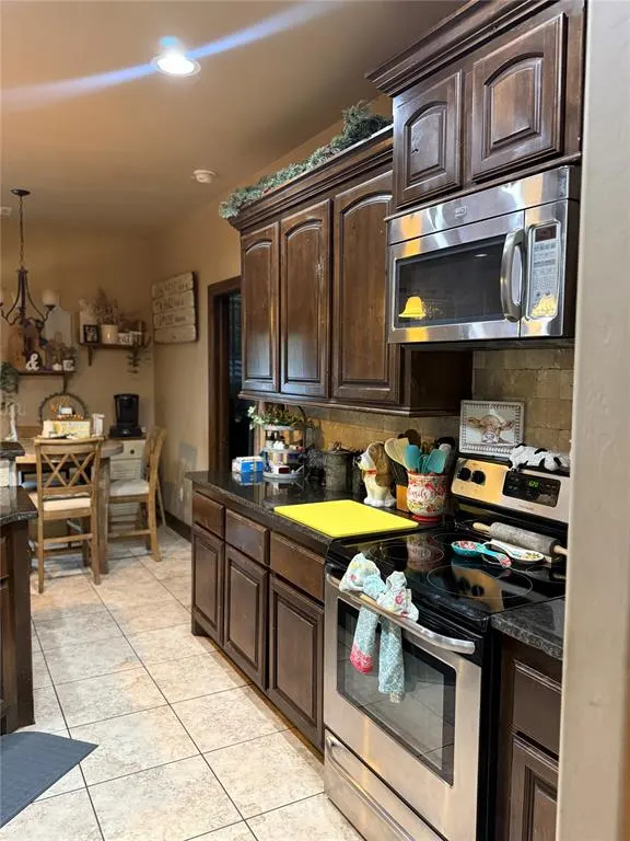 Photo 2 — 1751 E Lily Lane, Mustang, OK 73064