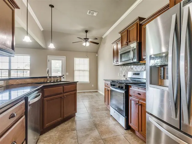 Front exterior — 1415 Spoonwood Drive, Norman, OK 73071