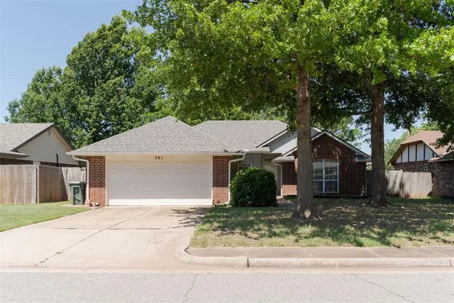 Front exterior — 301 N Rockypoint Drive, Edmond, OK 73003