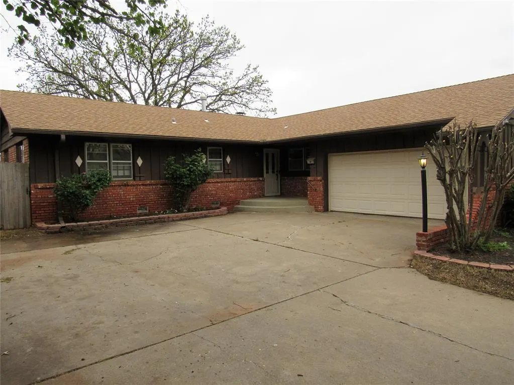Front exterior — 9909 Sunnymeade Place, Oklahoma City, OK 73120