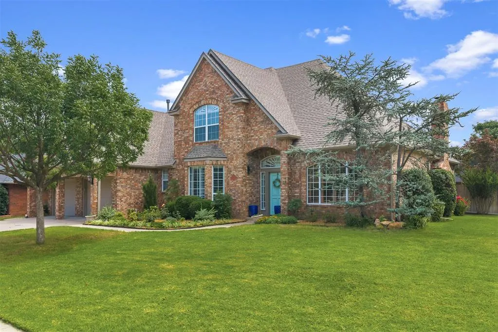 Front exterior — 617 W Riverwalk Court, Norman, OK 73072