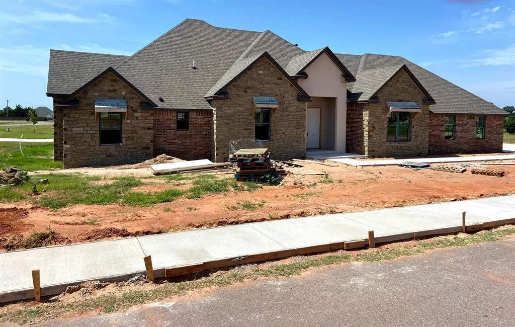 Front exterior — 140 W Linn Drive, Mustang, OK 73064