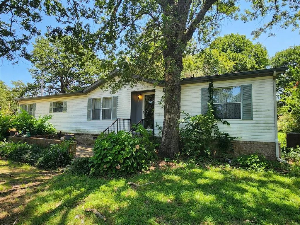 Front exterior — 7727 Winding Path, Kingston, OK 73439