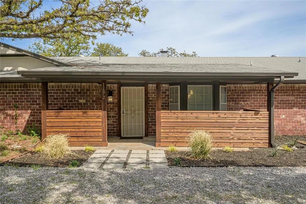Front exterior — 1172 Woodcrest Drive, Harrah, OK 73045