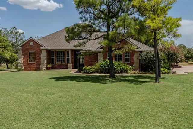 Front exterior — 13410 Silver Ridge Road, Yukon, OK 73099