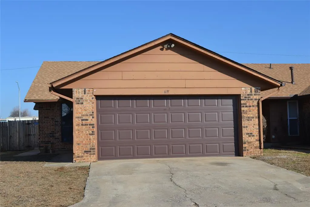 Front exterior — 619 Peppertree Lane, Midwest City, OK 73110