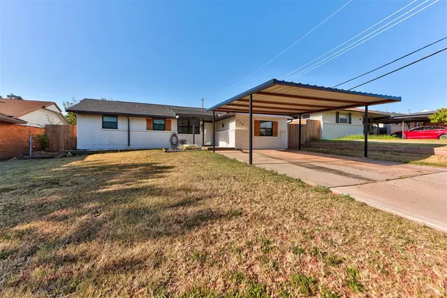 Front exterior — 704 SW 1st Street, Moore, OK 73160