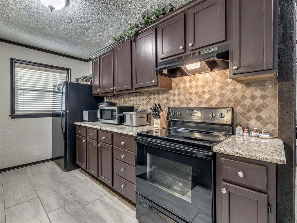 Photo 13 — 601 NW 50th Street, Oklahoma City, OK 73118