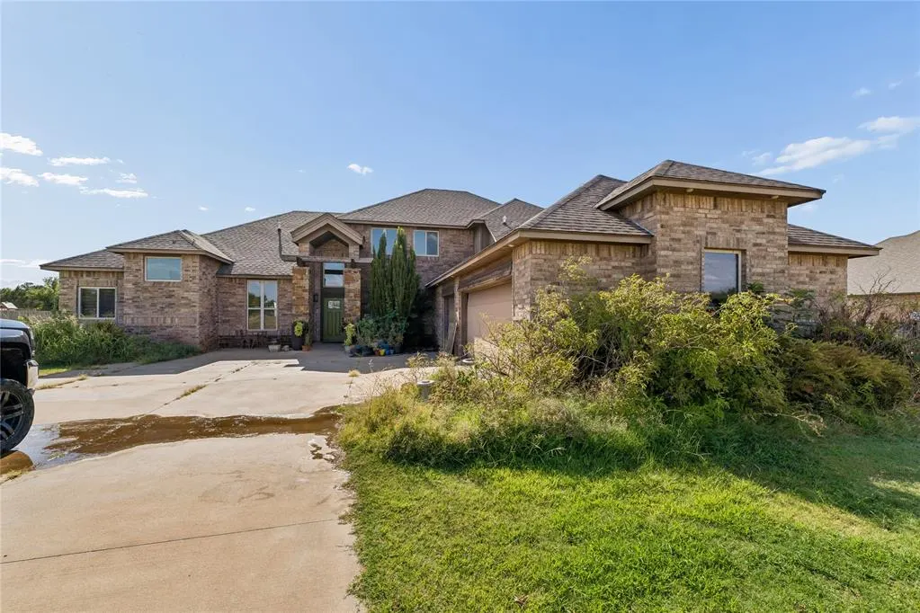 Front exterior — 20897 Highlander Ridge Drive, Edmond, OK 73012