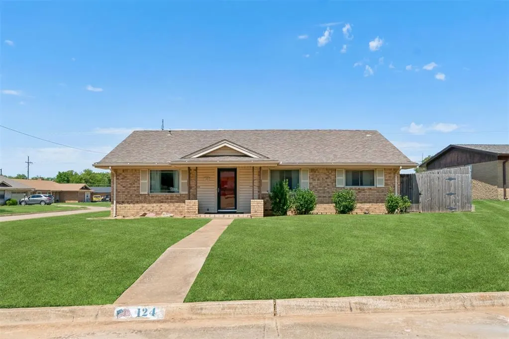 Front exterior — 124 Ruskin Place, Chickasha, OK 73018