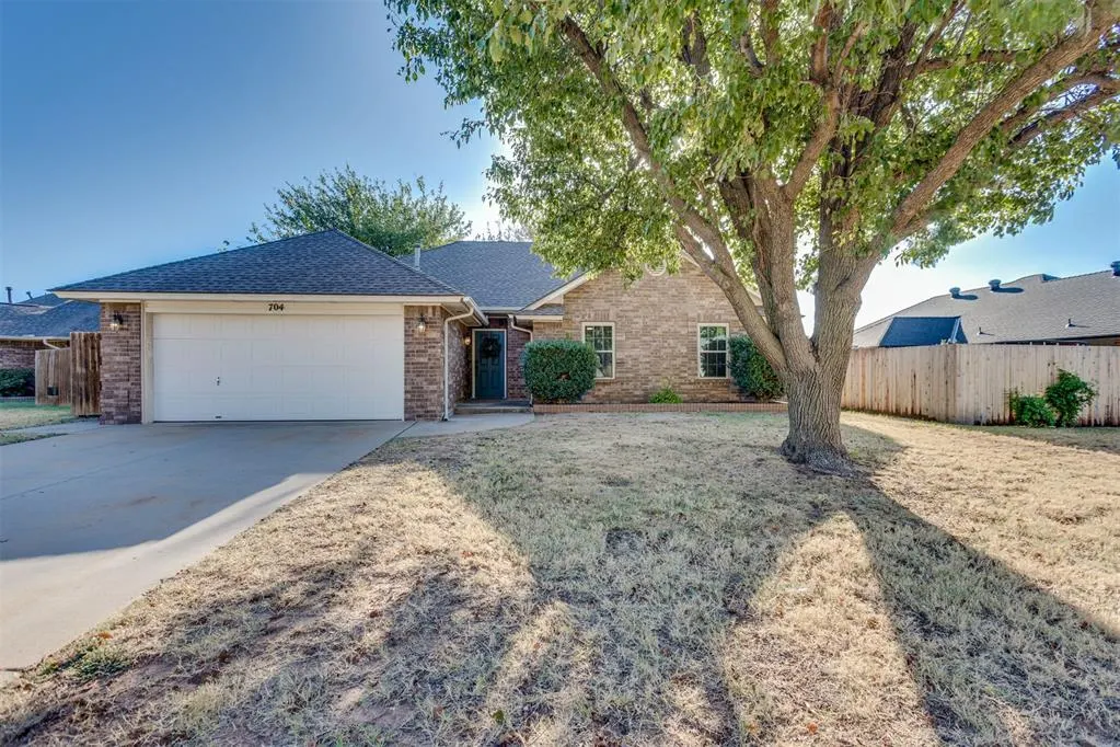Front exterior — 704 Gregg Court, Yukon, OK 73099