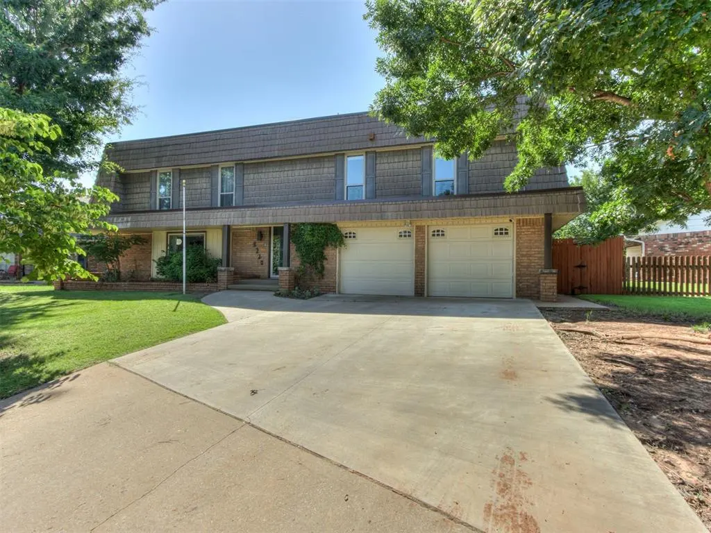 Front exterior — 9220 Sutton Place, Oklahoma City, OK 73132