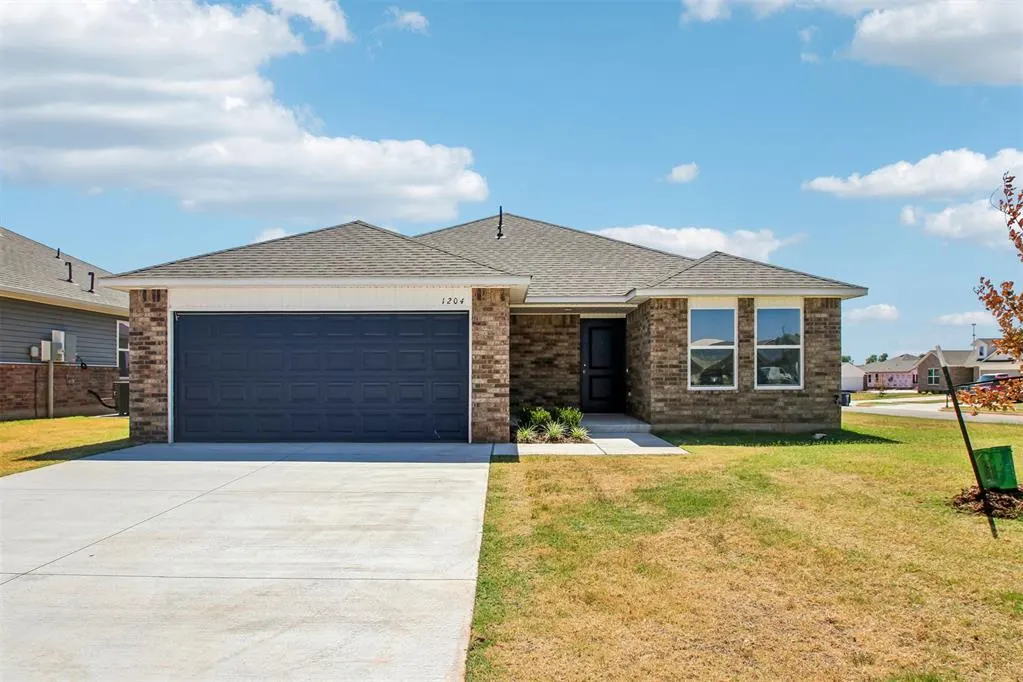 Front exterior — 1204 E Ruger Lane, Mustang, OK 73064