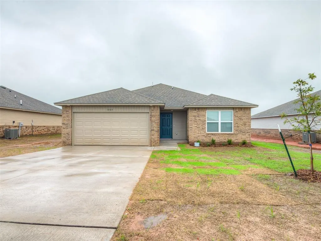 Front exterior — 1009 S Colt Lane, Mustang, OK 73064