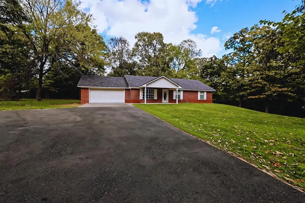 Photo 2 — 317 Sweet Home Road, Broken Bow, OK 74728