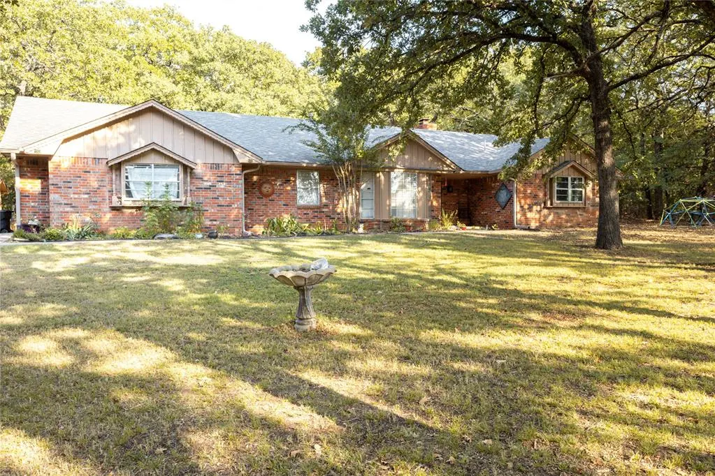 Front exterior — 507 Whispering Oaks, Tecumseh, OK 74873