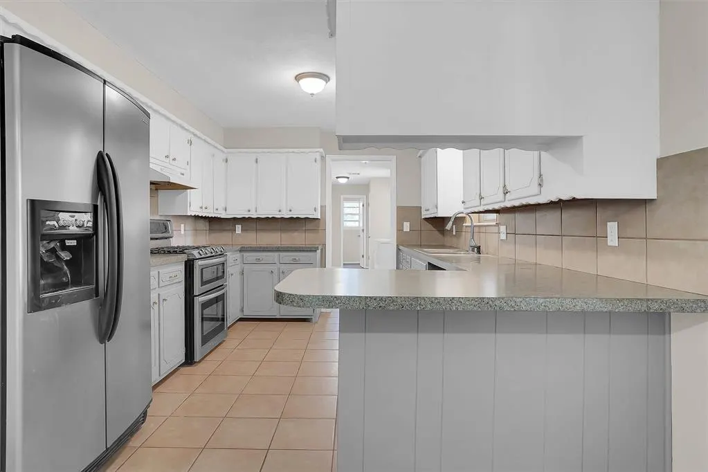 Photo 11 — 117 E 4th Street, Erick, OK 73645