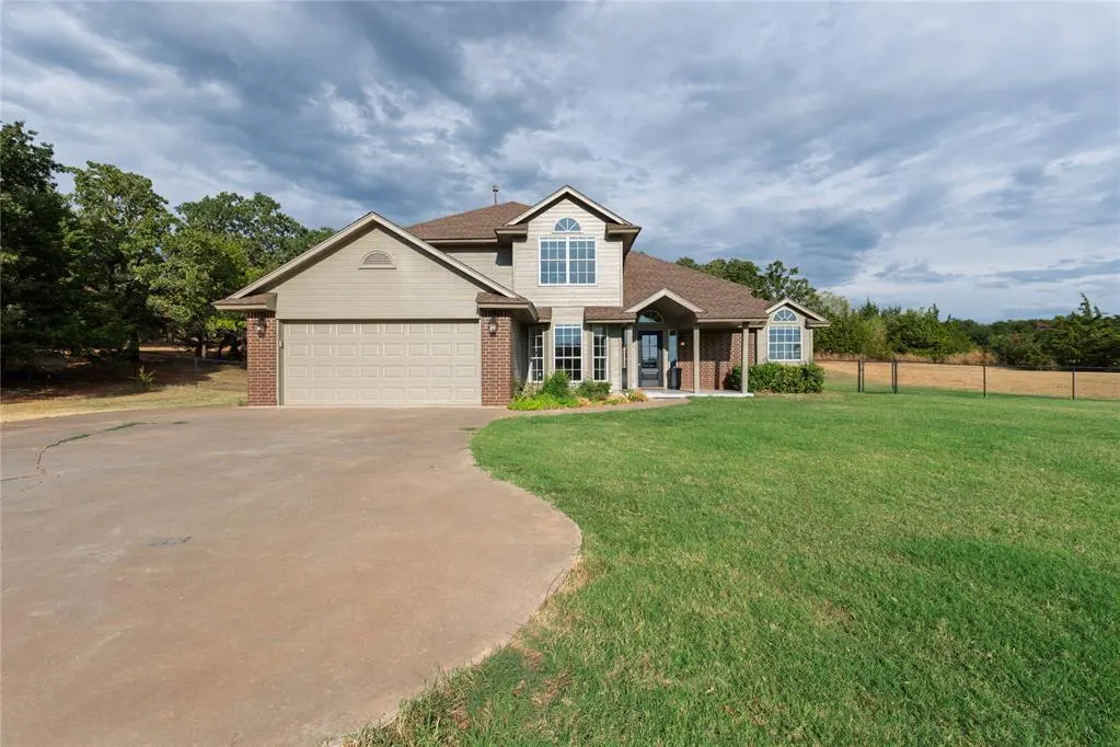 Front exterior — 100323 S Shadyoak Drive, Harrah, OK 73045