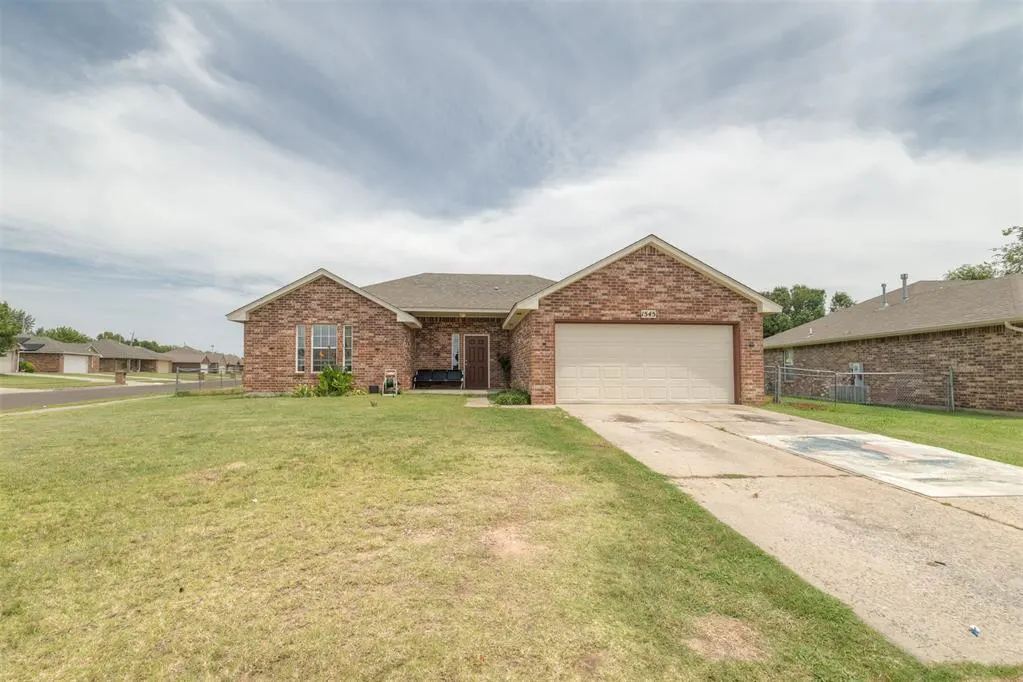 Photo 2 — 1545 Tudor Drive, Moore, OK 73160