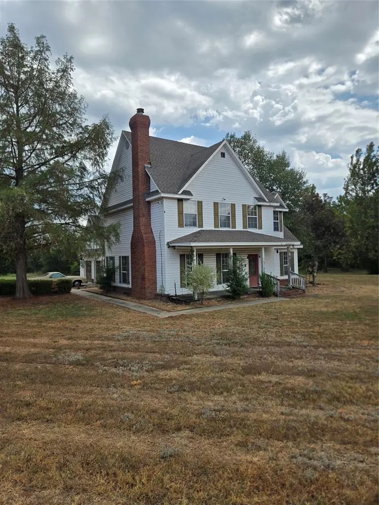 Front exterior — 1300 Rolling Hills Drive, Harrah, OK 73045