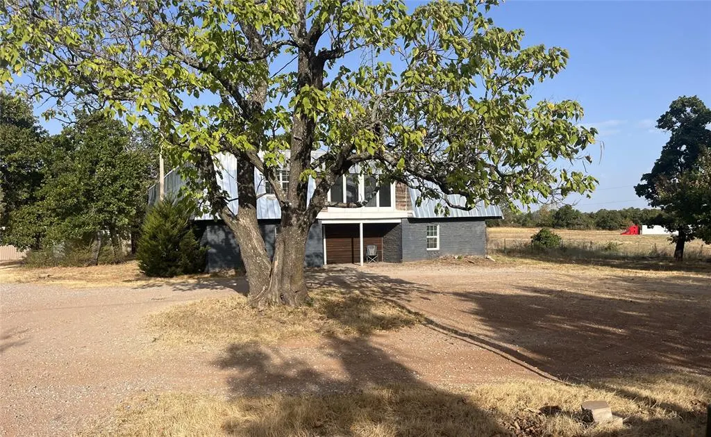 Front exterior — 205 Whispering Lane, Newcastle, OK 73065