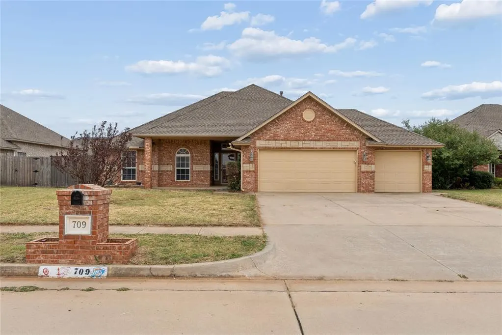 Front exterior — 709 N White Tail Way, Mustang, OK 73064