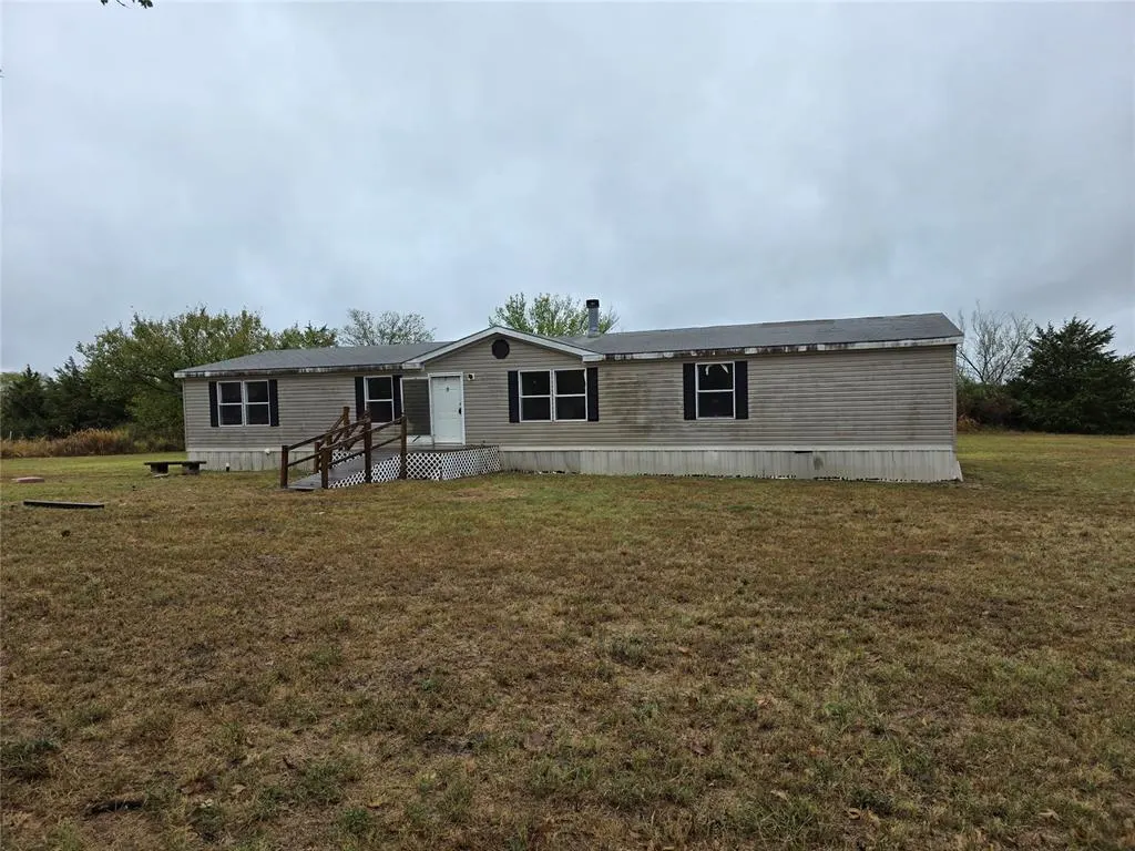 Front exterior — 619 S Madison Street, Maud, OK 74854