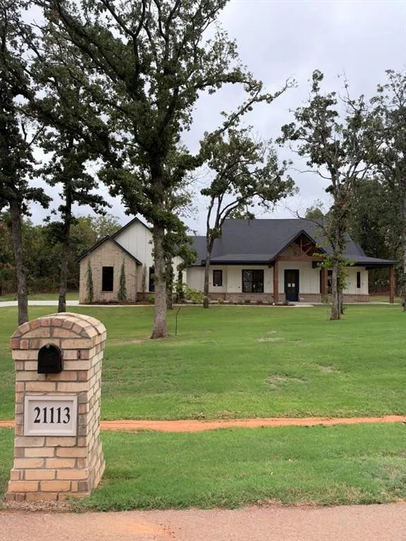Front exterior — 21113 Reserve Circle, Harrah, OK 73045