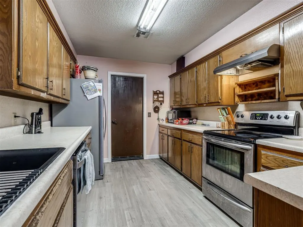 Photo 14 — 409 NE 9th Street, Blanchard, OK 73010