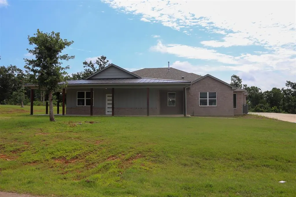 Front exterior — 1716 Kalidy Drive, Choctaw, OK 73020